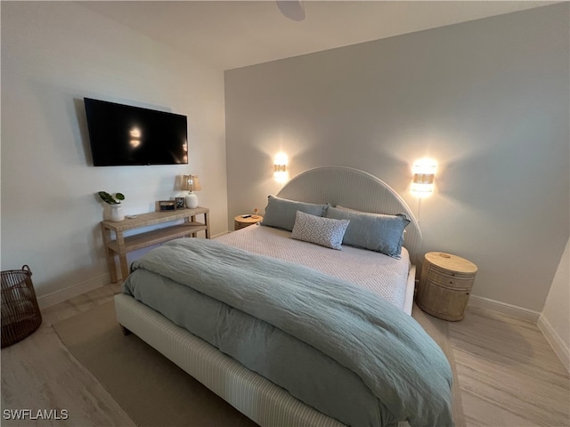 bedroom featuring light hardwood / wood-style floors