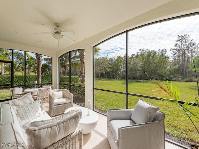 sunroom / solarium with ceiling fan and a wealth of natural light