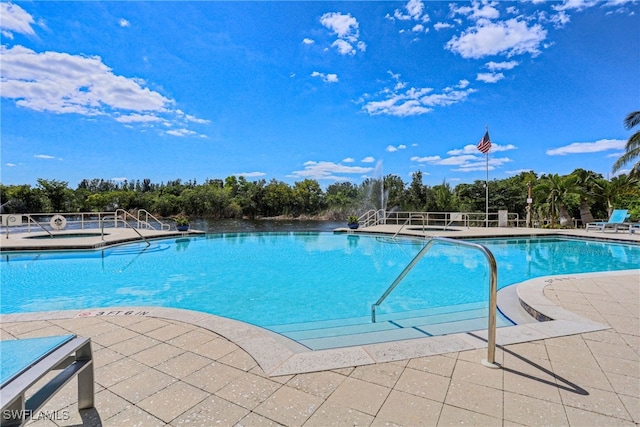 pool featuring a patio area