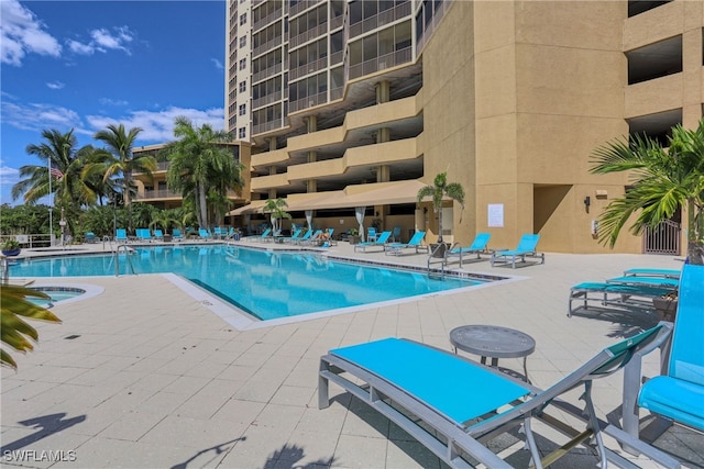 view of pool featuring a patio area