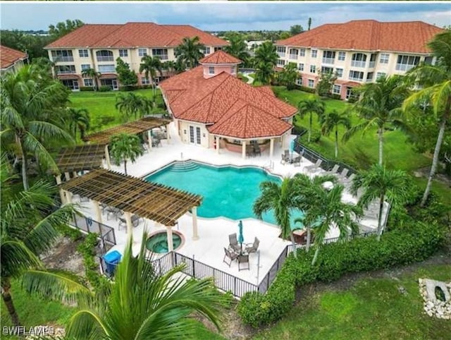 view of pool with a patio and a pergola