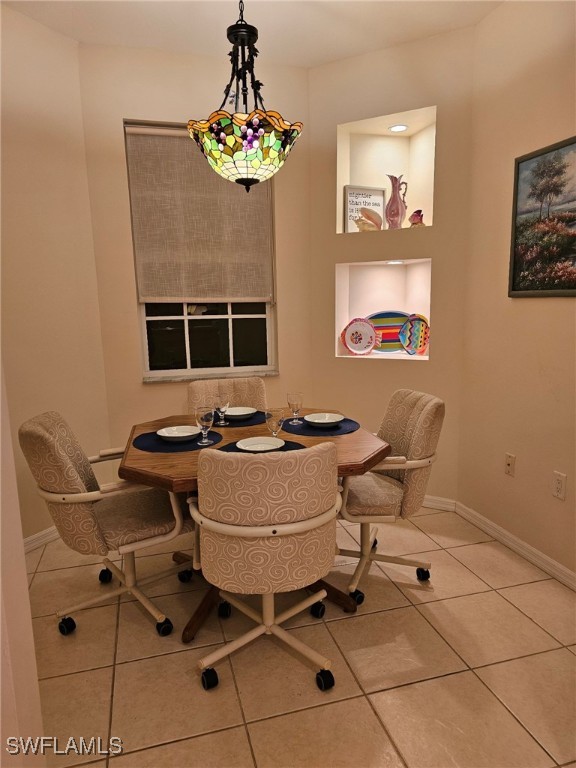 view of tiled dining space