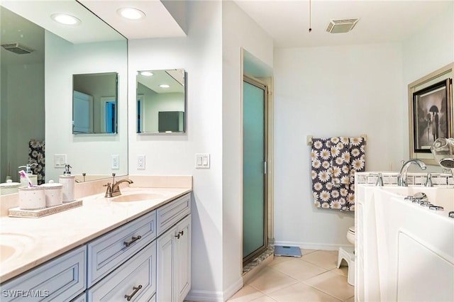 bathroom with walk in shower, tile patterned flooring, vanity, and toilet