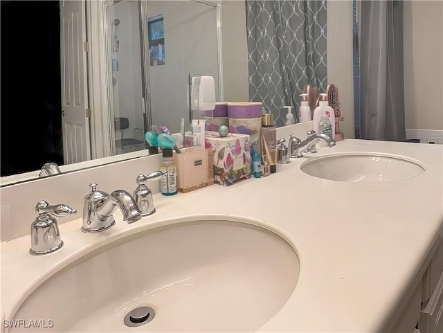 bathroom with vanity and curtained shower