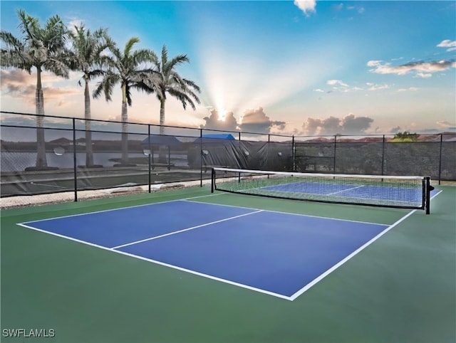 view of sport court featuring basketball hoop