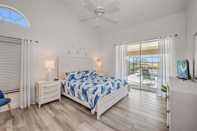 bedroom featuring light wood-type flooring, ceiling fan, access to exterior, and multiple windows