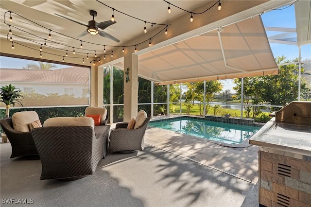 view of pool featuring a water view and a patio area