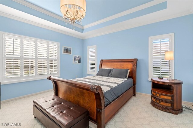 carpeted bedroom with a notable chandelier, crown molding, and a raised ceiling