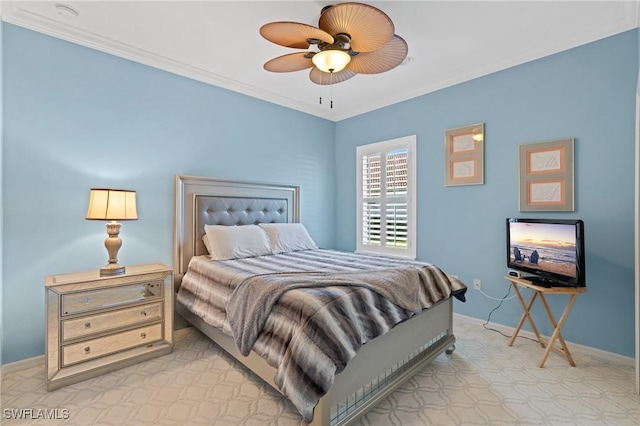 bedroom with light carpet, ceiling fan, baseboards, and crown molding