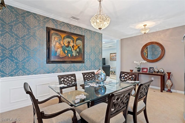 dining room featuring baseboards, ornamental molding, visible vents, and wallpapered walls