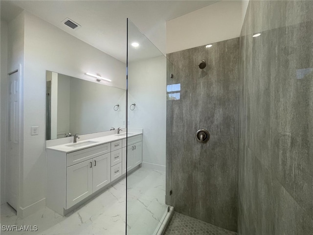 bathroom featuring vanity and a shower