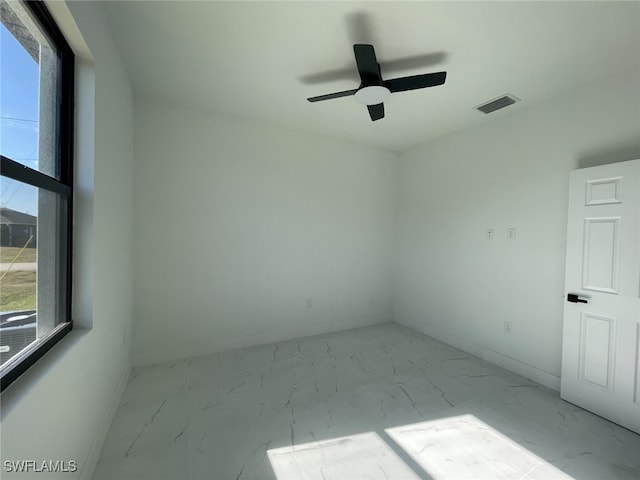 empty room with ceiling fan