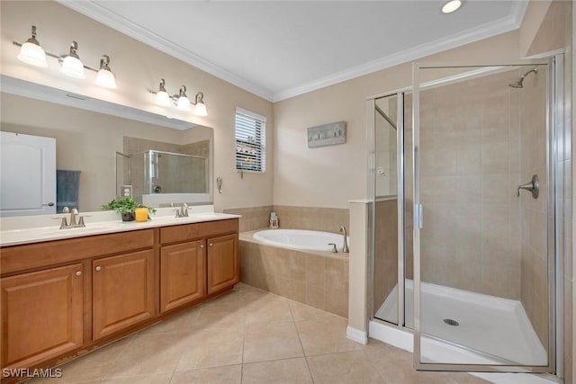 bathroom with tile patterned floors, vanity, ornamental molding, and independent shower and bath