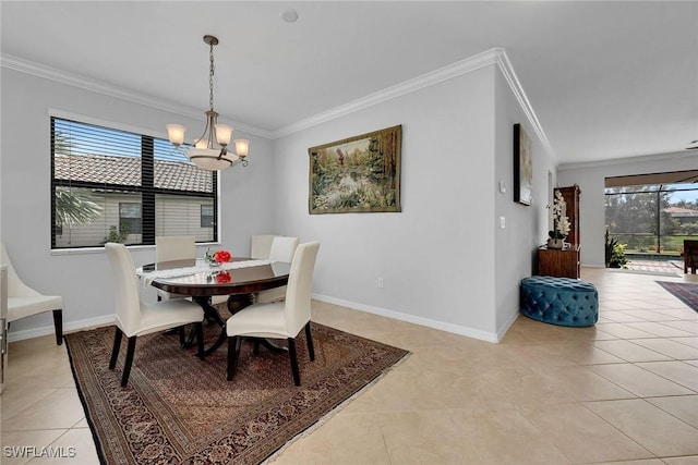 dining area with light tile patterned floors, plenty of natural light, crown molding, and a notable chandelier