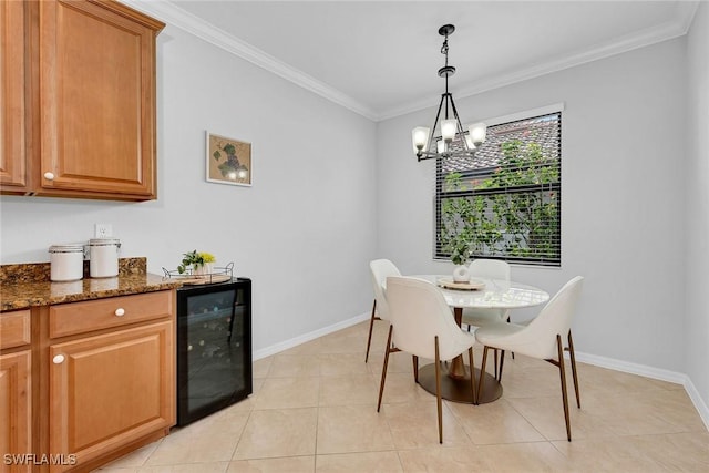 dining space featuring light tile patterned flooring, ornamental molding, beverage cooler, and an inviting chandelier