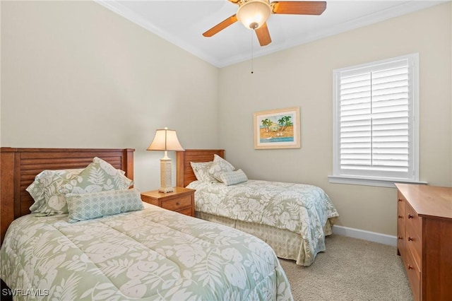 bedroom with ceiling fan, light colored carpet, and crown molding