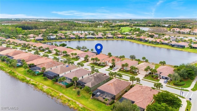 drone / aerial view featuring a water view