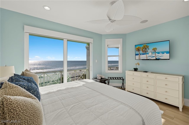 bedroom featuring ceiling fan and light wood-type flooring