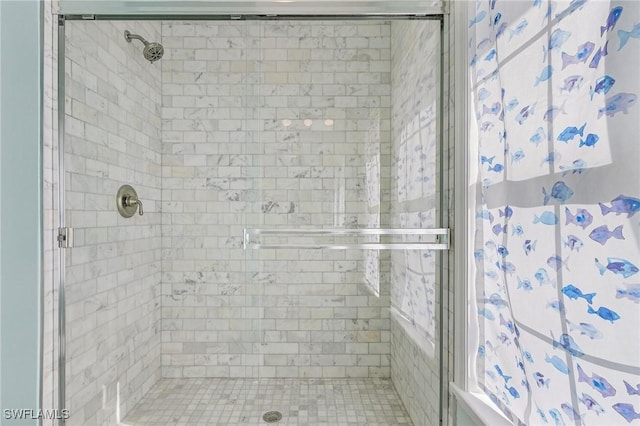 bathroom with an enclosed shower