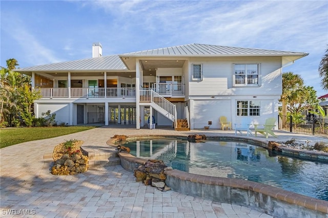 back of property with a patio area