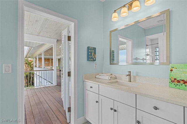 bathroom featuring hardwood / wood-style floors and vanity