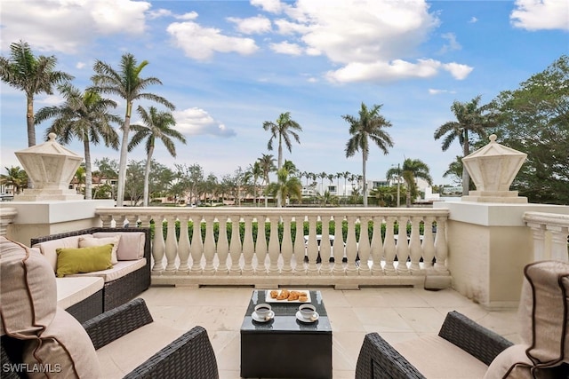 4021 Gulf Shore Blvd N Unit V-16, Naples, FL 34103 - view of patio with an outdoor living space