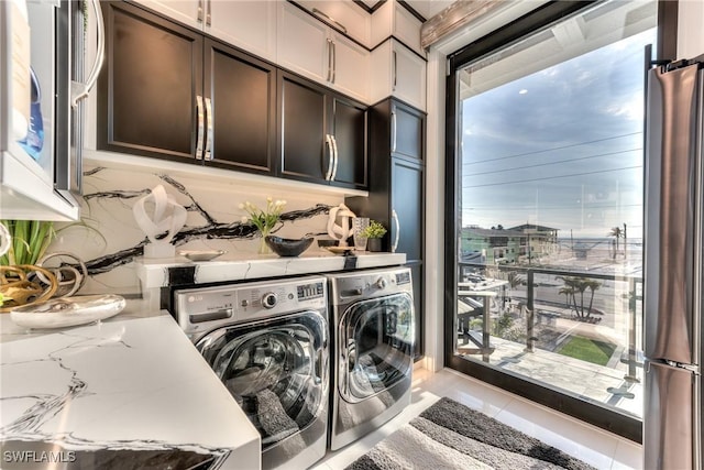 washroom featuring separate washer and dryer