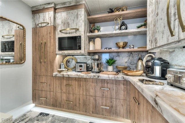 kitchen with decorative backsplash, wood ceiling, and black microwave