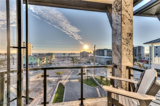 view of balcony at dusk