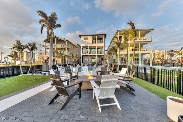 view of patio / terrace featuring an outdoor fire pit