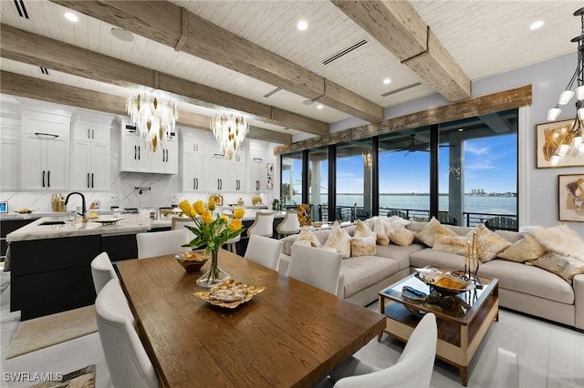 dining space with recessed lighting, wood ceiling, an inviting chandelier, and beam ceiling