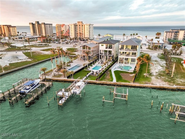 bird's eye view with a city view and a water view