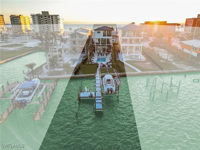 exterior space featuring a water view, a boat dock, and boat lift