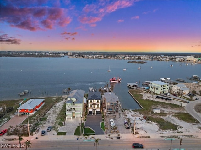 drone / aerial view featuring a water view