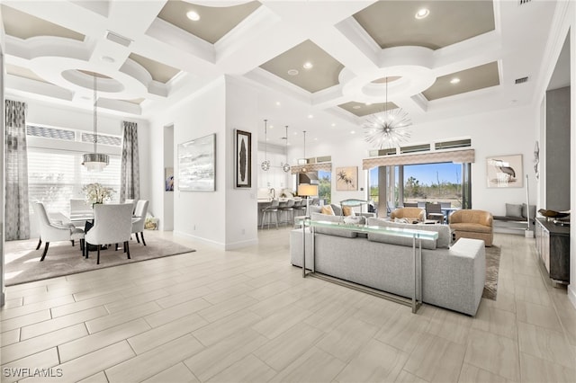 living room with a high ceiling, an inviting chandelier, coffered ceiling, crown molding, and beamed ceiling