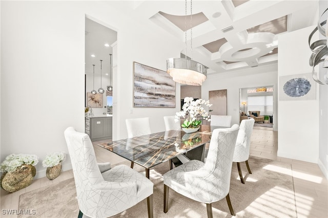 dining area featuring beamed ceiling, light tile patterned floors, and coffered ceiling