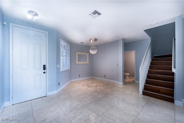 view of tiled foyer entrance