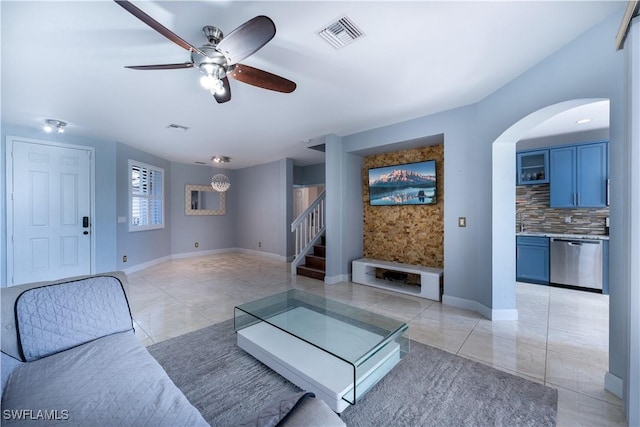 living room featuring ceiling fan