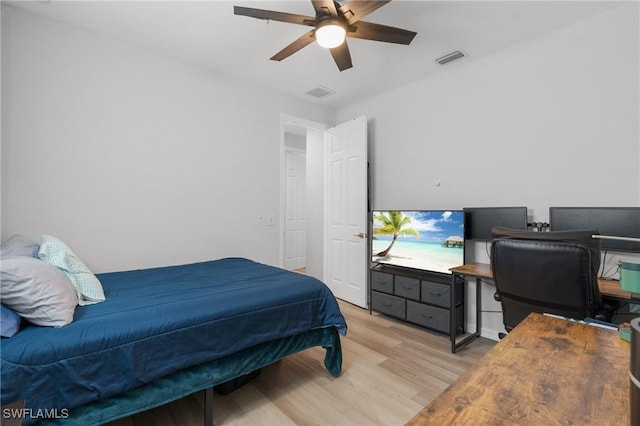 bedroom featuring ceiling fan and light wood-type flooring