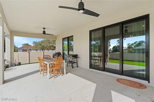 view of patio / terrace featuring ceiling fan