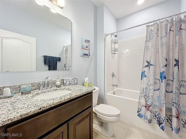 full bathroom featuring toilet, shower / tub combo, vanity, and tile patterned floors