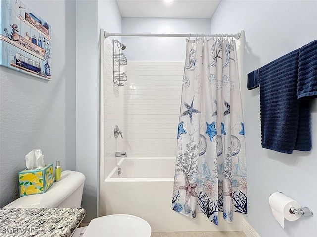 bathroom with toilet and shower / tub combo with curtain