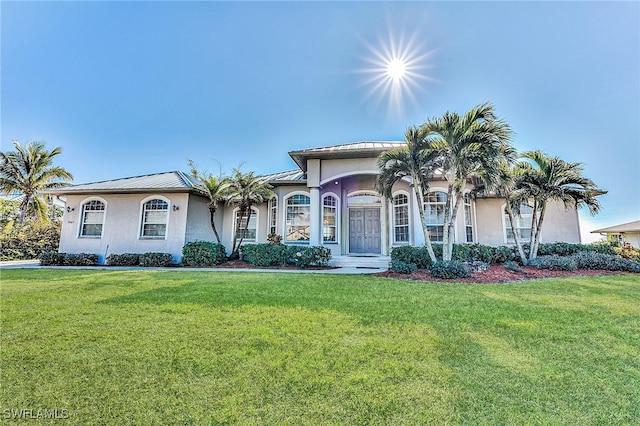 view of front of house with a front lawn