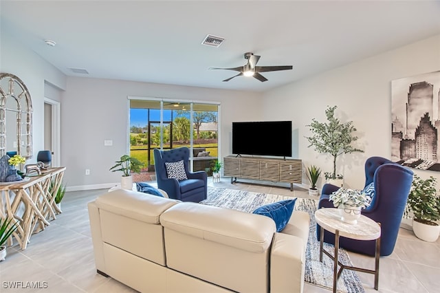 living room with light tile patterned flooring and ceiling fan