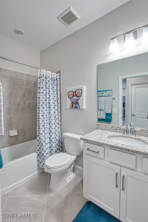 full bathroom featuring vanity, tile patterned floors, shower / bath combination with curtain, and toilet