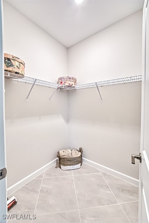 walk in closet featuring tile patterned floors