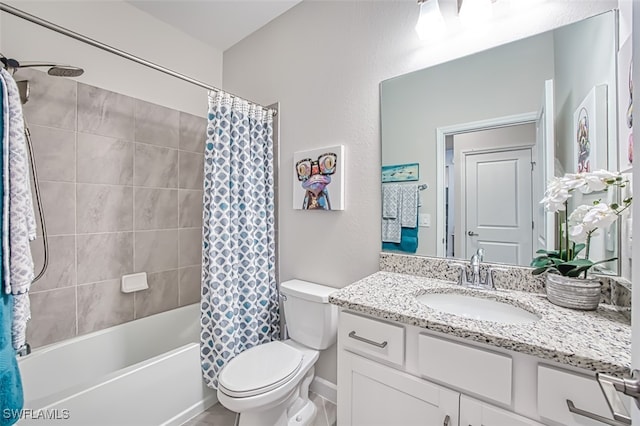 full bathroom with shower / bathtub combination with curtain, vanity, and toilet