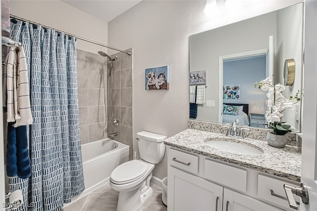 3101 E Windsor Dr, Alva, FL 33920 - ensuite bathroom with toilet, vanity, shower / bathtub combination with curtain, and tile patterned flooring