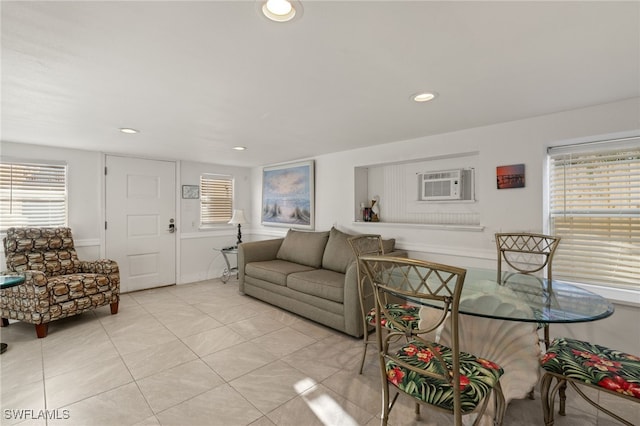 tiled living room featuring a wall mounted AC