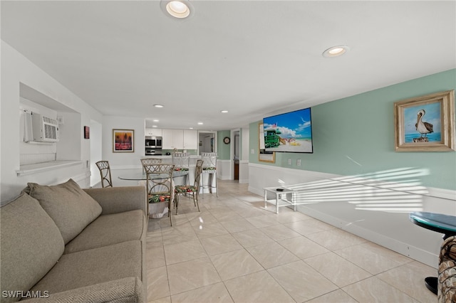201 Miramar St, Fort Myers Beach, FL 33931 - living room featuring light tile patterned flooring, recessed lighting, and baseboards